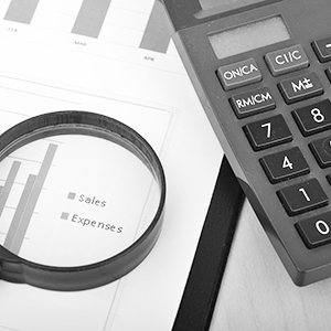 Magnifying glass and calculator